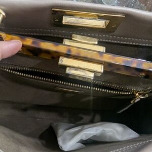 Elegant Brown Handbag with Gold Accents